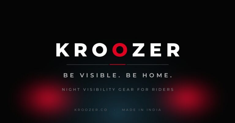 Kroozer brand card: the KROOZER wordmark in white on a dark background, with two red strobe pulses low on either side and the line Be visible. Be home.