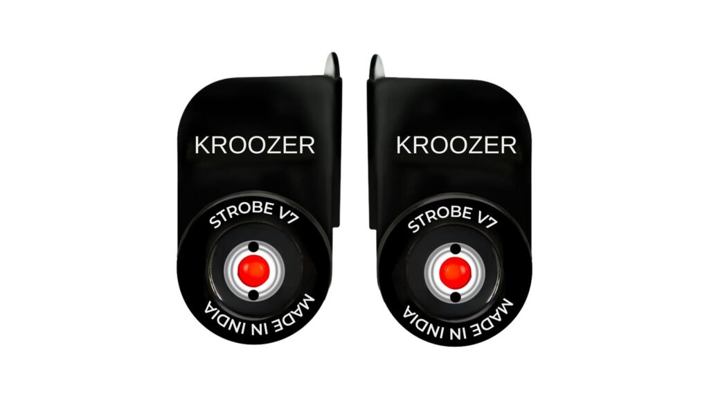 A pair of KROOZER Strobe V7.0 Pro pods, black housings marked Strobe V7 and Made in India, each with a red LED in a white ring